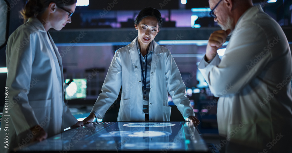 Poster modern hospital medical research center: diverse colleagues gathered around interactive touch screen