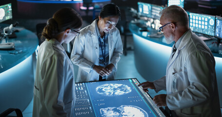 Modern Hospital Medical Research Center: Diverse Colleagues Gathered Around Interactive Touch...