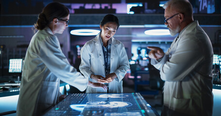 Modern Hospital Medical Cancer Research Center: Diverse Scientists Gathered Around Interactive...