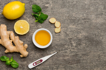 Natural cold and flu home remedies and thermometer. Natural ingredients for immunity stimulation...