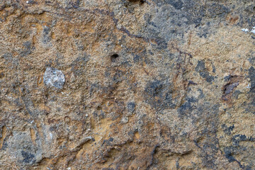 Abstract wall pattern with beige and blue coloured patches. Concept wallpaper, bacground.