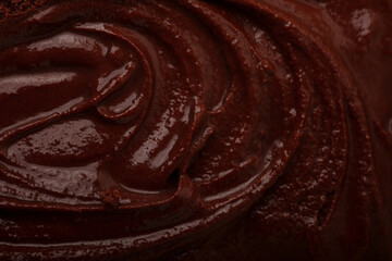 Selbstgemachtes dunkles Schokoladeneis von oben als Hintergrund Textur