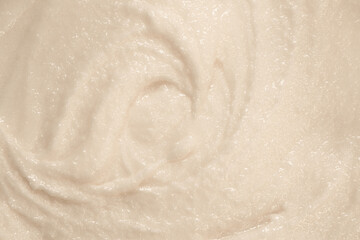 Baby food close-up. Porridge for newborns. Background food texture for kids. Milk mixture.