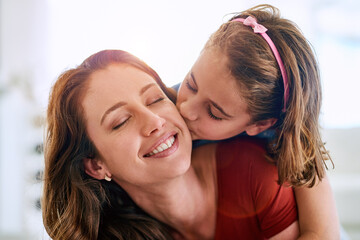 Mom, girl and kiss with smile in family home for love, trust and bonding together on mothers day....
