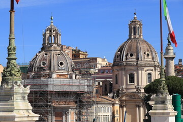 Fototapeta na wymiar View from the Vittoriano War Memorial with Two Church Domes in Rome, Italy