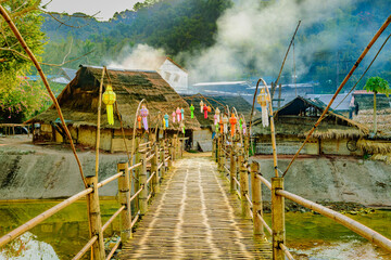 The morning atmosphere of Bo Kluea District around the small bamboo bridge crossing the Mang River...