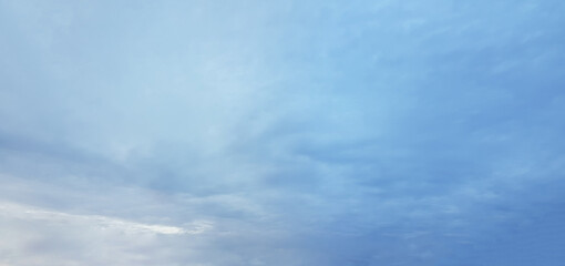 Beautiful blue cloudy sky, panoramic cloudscape skyline background