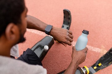 Man looking at his smartwatch
