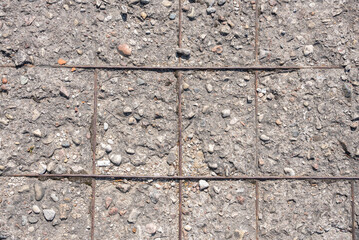 Fototapeta premium aged concrete wall with rebar showing through texture