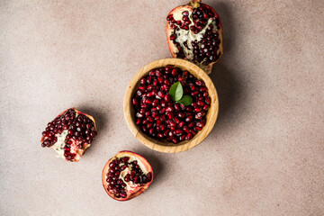 Pieces and grains of ripe pomegranate. Pomegranate seeds.