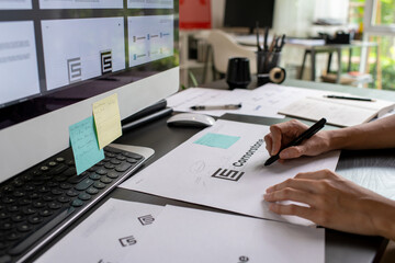 Asian Graphic designer working in office. Designing logo Artist Creative Designer Illustrator...