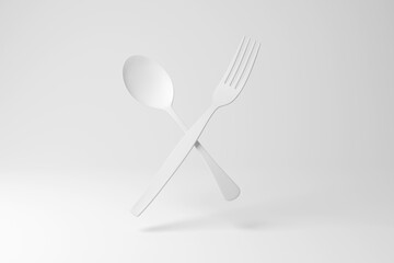 White fork and spoon floating in mid air on white background in monochrome and minimalism. Illustration of the concept of cutlery, gourmet food, chefs and restaurants