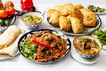 Pilaf and soup, Uzbek traditional meat samsa.
