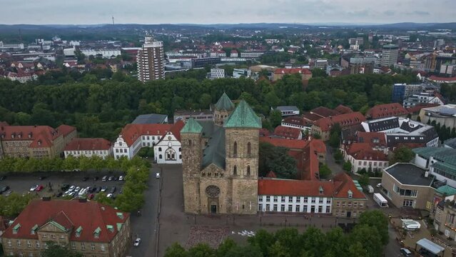 Aerial drone view of Dom St. Petrus in Osnabr&uuml;ck, Germany. St. Peter's Cathedral serves as the cathedral of the Roman Catholic Diocese of Osnabr&uuml;ck. 