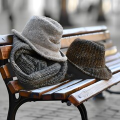 knitted gray hat with a scarf for cold weather in winter