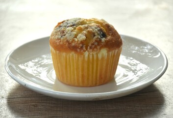 blueberry muffin topping sugar in paper on dish