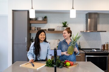 Food vlogger streaming in home kitchen