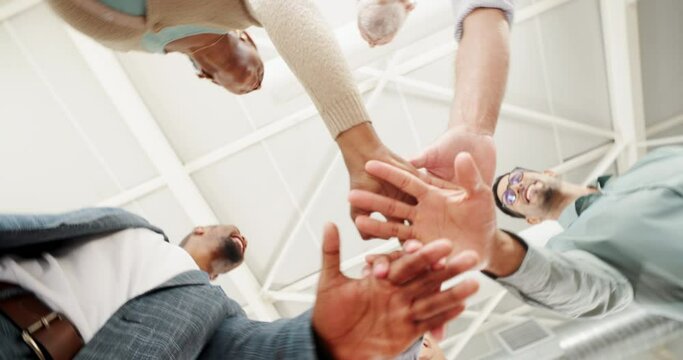 Business people, hands stack and circle with low angle with at office with cheers, win and goals in 360 for deal. Men, women and celebration in scrum with synergy, link or connection for achievement