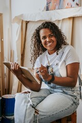 Woman artist sketching in her studio