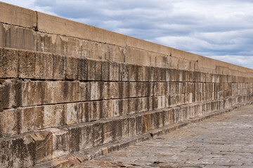 29 April 2024. Lossiemouth,Moray,Scotland. This is the interior pier wall of the Harbour at Lossiemouth on a grey cloudy afternoon.
