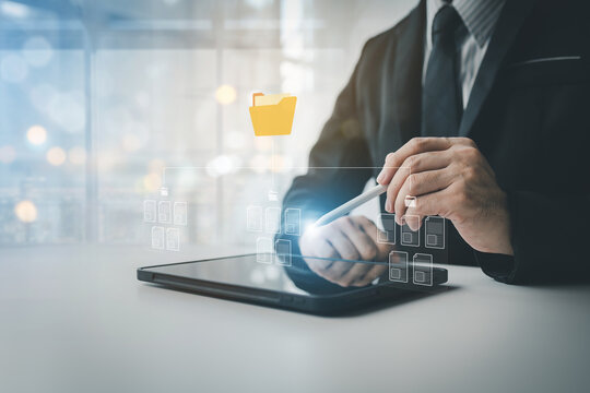 Concept managing data files, arranging data files in order and uploading files on the internet, storing work files on the cloud so that they can be accessed online, managing work files.