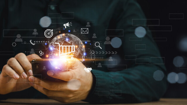 Digital Marketing Media Technology Graphic Concept, Business Lead And Customer Generation Magnet Pulling Figures, Businessman using mobile phone for marketing. Merchant marketing attracts customers