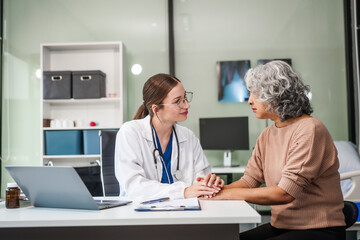 Caucasian female psychiatrist sits at her desk, providing mental health consultations and therapy...