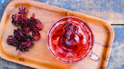 a glass of roselle tea. herbal drink for health