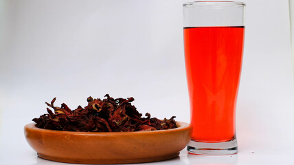 a glass of roselle tea. herbal drink for health