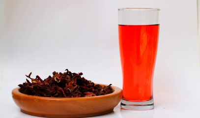 a glass of roselle tea. herbal drink for health