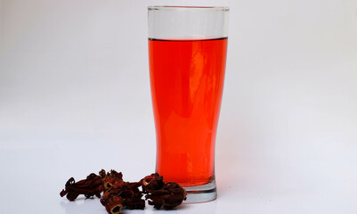 a glass of roselle tea. herbal drink for health
