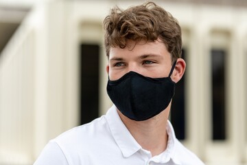 Man wearing face mask in park, the new normal lifestyle,