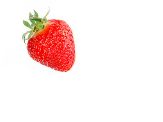 Side view bio strawberry with leaf, isolate. A whole strawberry on white.