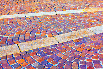 Brick walkway in the city. Cobblestone pavement street in old town