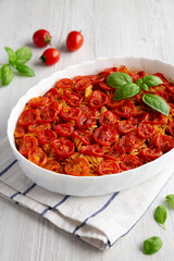 Homemade Easy Tomato Basil Pasta Bake, side view. Close-up.