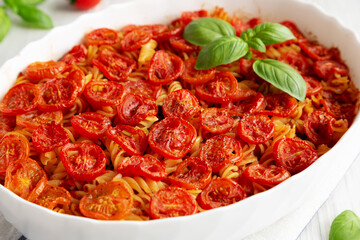 Homemade Easy Tomato Basil Pasta Bake, side view. Close-up.
