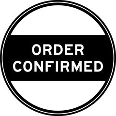 Black color round seal sticker in word order confirmed on white background