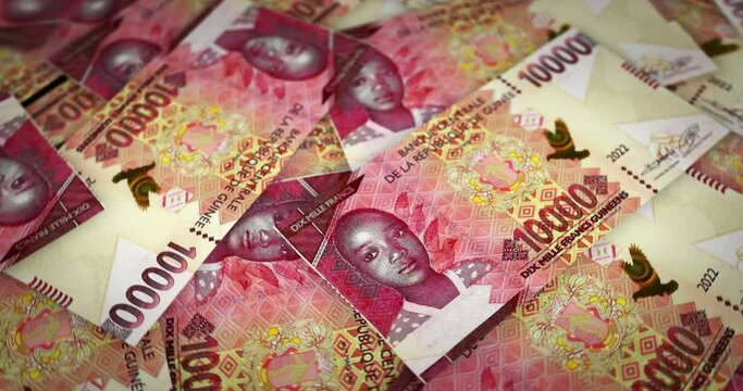 Guinea Franc growing pile of money. Guinean GNF banknotes loop rotaring. Seamless and looped background concept of finance, economy crisis, inflation and business.