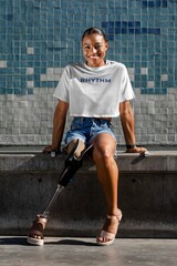 Confident amputee woman wearing white plain shirt, happy summer image