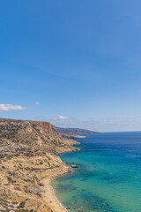 Vertical view of beautiful cliffs with blue sea. Summer background.