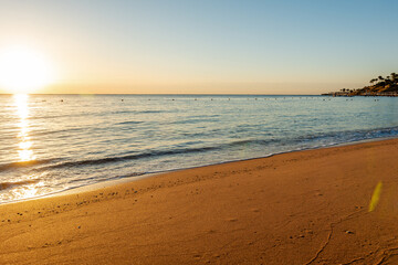View of calm beautiful sea during sunset. Holiday vacation and travel concept.