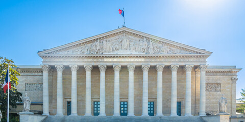 Assemblee Nationale name of the facade of the building in Paris, France on a sunny day