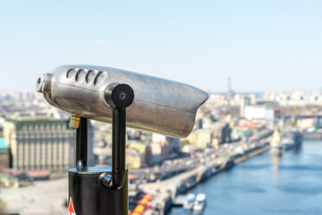 Coin operated binocular looking to the cityscape.