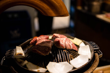 delicious grilled meat on barbecue