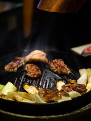 delicious grilled meat on barbecue