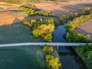 sunrise over farmland and the Lamine River at Roberts Bluff access in Missouri, springtime aerial view