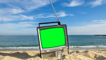 televisions with green screen next to the sea, to add your own content onto the tvs - 801250239