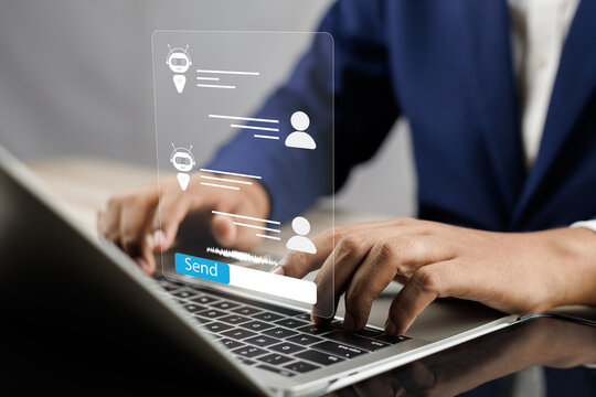 Businessman using AI chatbot conversation assistant in app on device for virtual assistance and customer support digital communication, Contact us Online service with AI Chatbot for efficient support