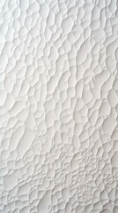 White eggshell-like surface with many small dents