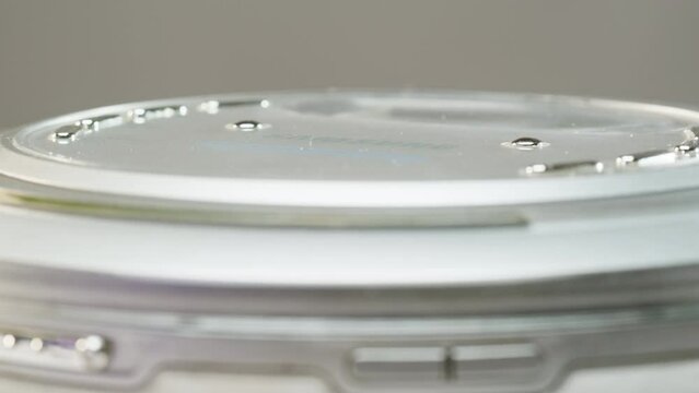 Vintage cd music player close-up. Using portable music player for listening with compact disc